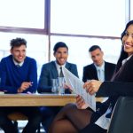 A committee meeting around a table