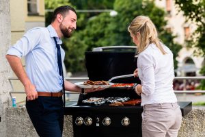Your Strategy: Cooking up a Searing Success, two people a a barbque