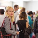 Woman at an airport standing in line