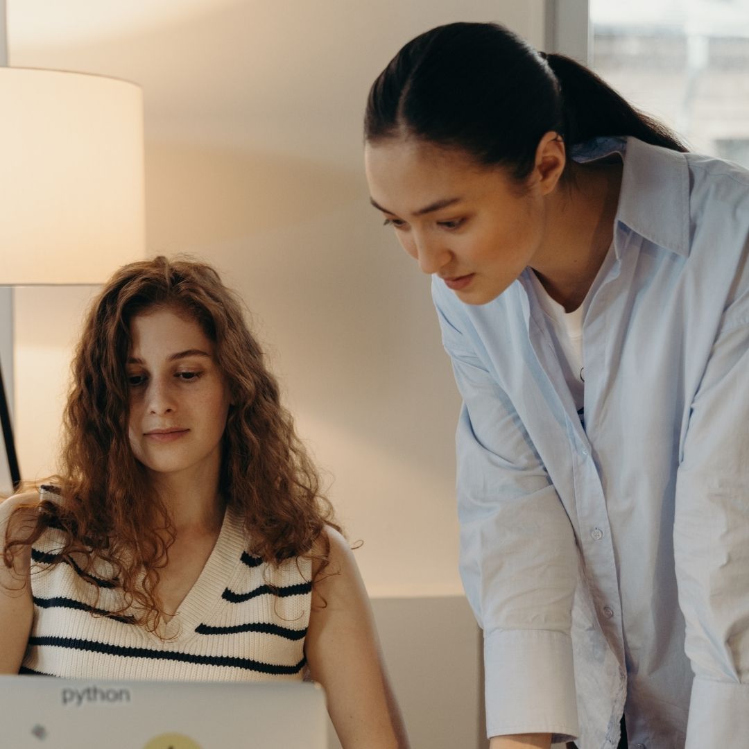 Investment, 2 woman looking at a computer screen