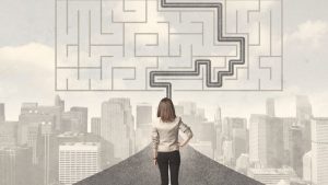 woman standing in front of maze