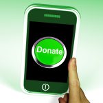 Green Donate Button On Mobile Phone