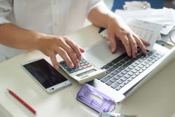 Picture of a woman at a keyboard