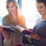 Two women reading books